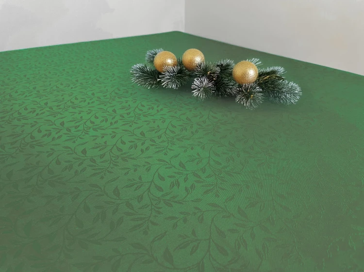 Ciemnozielony obrus plamoodporny 120 × 120 cm w drobne listki – aranżacja na stole