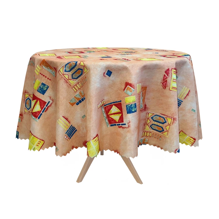 Okrągły obrus plamoodporny 160 cm w kolorowe figury – aranżacja na stole