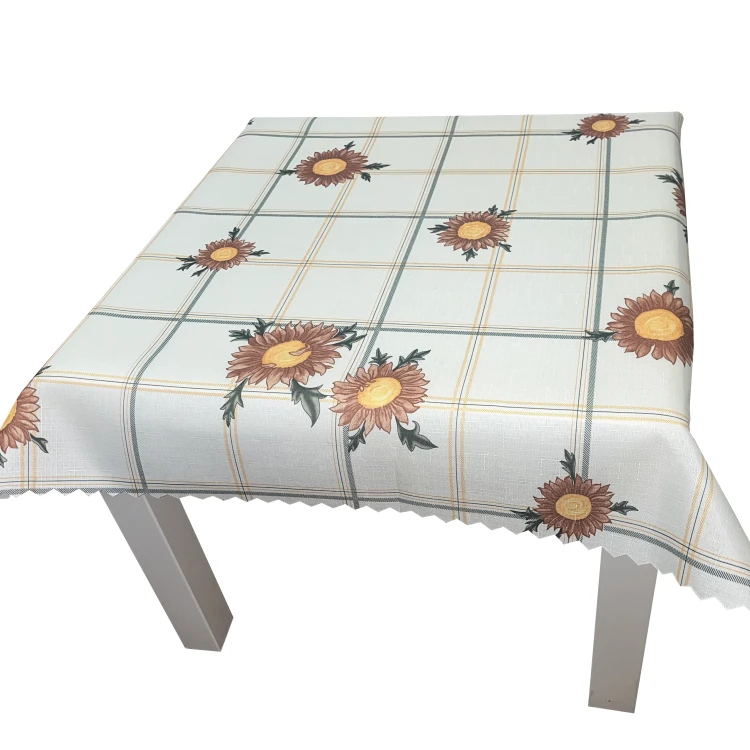 Obrus plamoodporny 75 × 75 cm w słoneczniki i cienką kratę – widok na stole