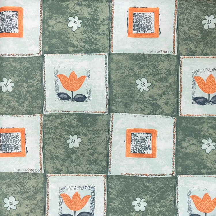 Obrus plamoodporny 75 × 75 cm w zieloną kratę i pomarańczowe tulipany – zbliżenie wzoru tkaniny