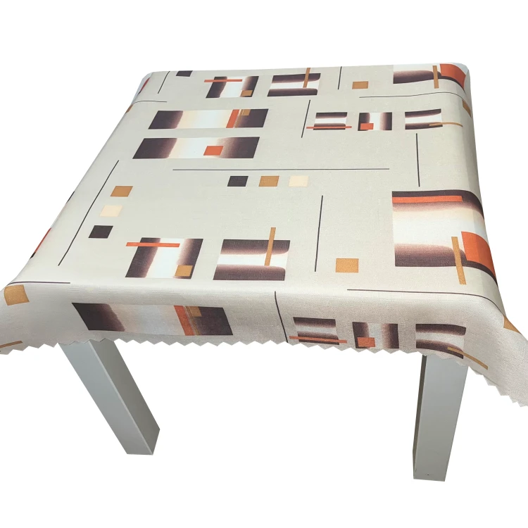 Obrus plamoodporny 75 × 75 cm w brązowo-pomarańczowe figury geometryczne – widok obrusu od przodu na stole