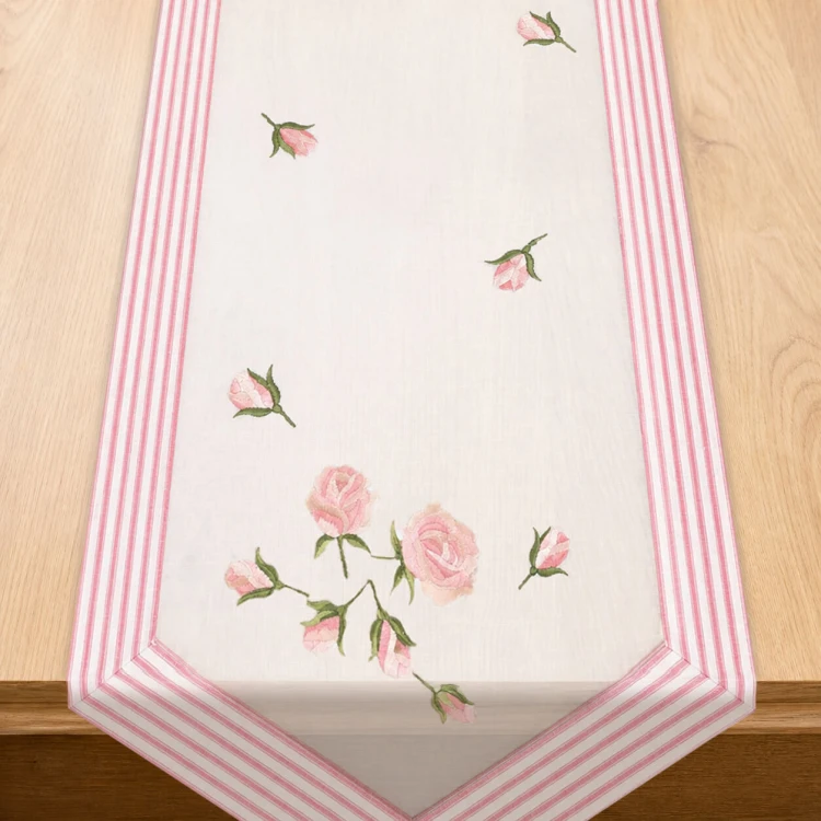 Bieżnik Salsa 40 × 140 cm róża, białe tło – widok w aranżacji na stole