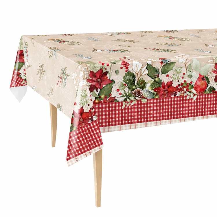 Obrus z ceraty FLO-1788-01 - gwiazdy betlejemskie, czerwona kratka – na stole